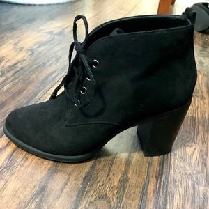 High heels black boots.